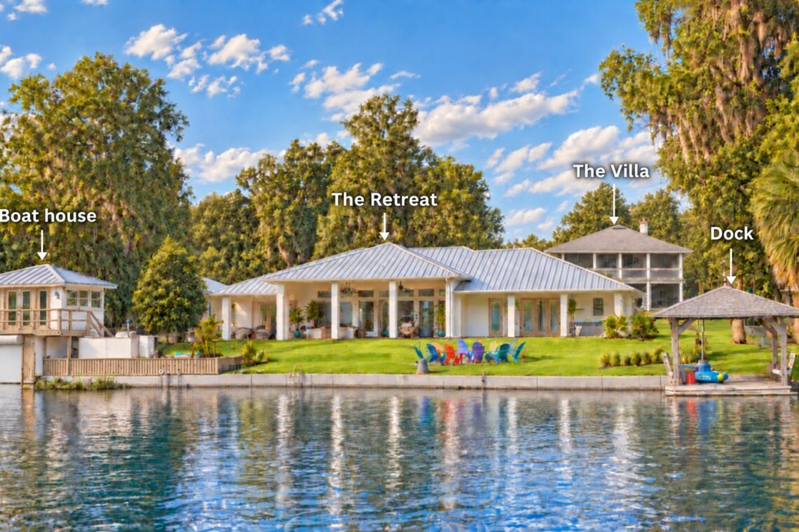 Riverfront view labeling The Retreat, The Villa, boathouse, and dock on Rainbow River